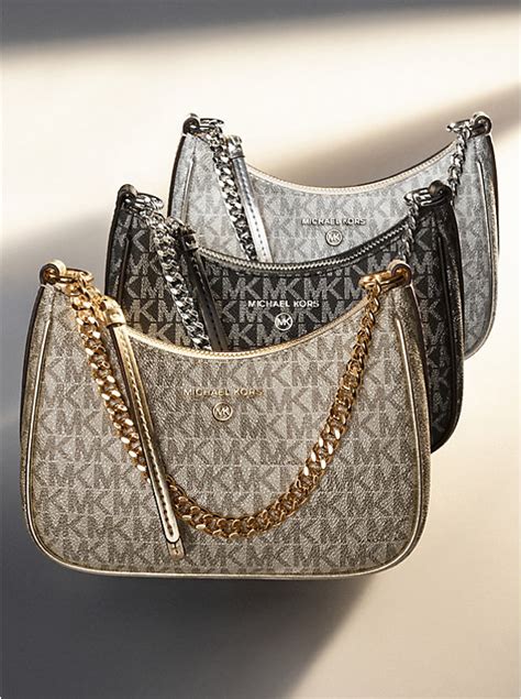 Jet Set Charm Small Metallic Leather Pochette .